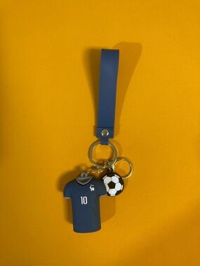 Others Follow Blue Soccer Jersey Keychain with Black & White Ball